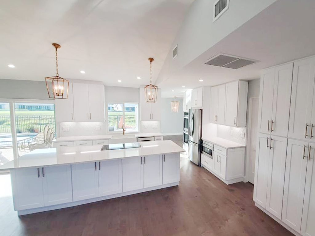 Bright kitchen with custom white cabinetry