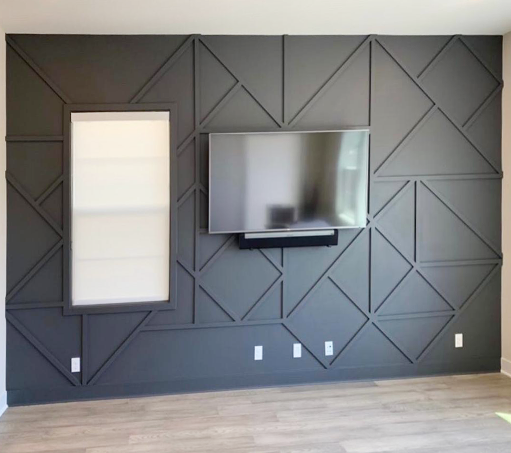 Custom geometric wall with television